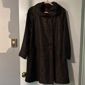 Gallery brand, Leopard print raincoat in brown and black, size medium.
